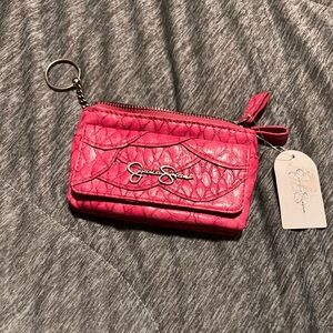 Brand new with tag Jessica Simpson keychain wallet.